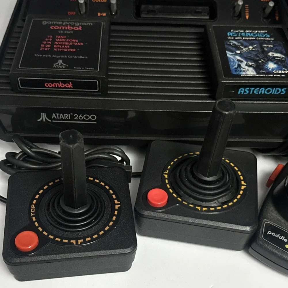 Atari 2600 Black Console RF w/ Joysticks, Paddle Controllers, Combat, Asteroids